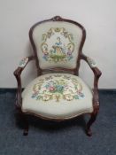 A stained beech framed salon armchair