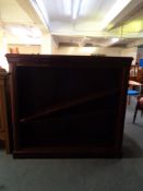 A set of early 20th century mahogany open bookshelves