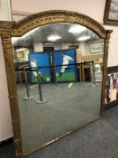 A large 19th century gilt framed mirror,