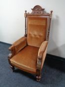 A late 19th century oak and walnut gent's armchair