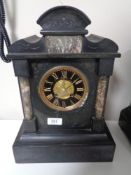 A Victorian slate mantel clock