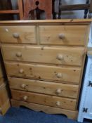 A pine six drawer chest