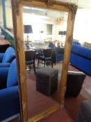 A gilt framed bevelled rectangular mirror