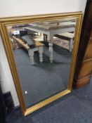 A gilt framed mirror