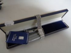 A Gent's Swiss Ingot wrist watch set with a 1g platinum ingot within the dial