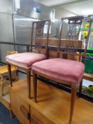 A pair of Victorian inlaid mahogany bedroom chairs