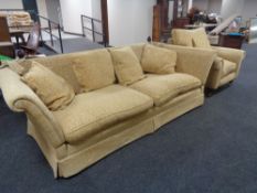 A three seater drop end settee with matching armchair in two-tone gold fabric CONDITION