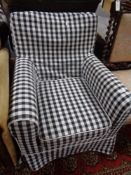 A contemporary black and white printed armchair