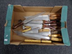A box of reenactment knives