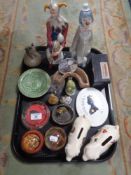 A tray of glass paperweights,