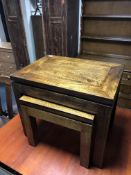 A nest of hardwood tables