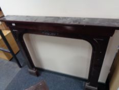 A tubular metal chair with stitched leather seat