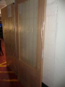 A light oak hardwood interior glazed door (new)