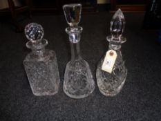Three crystal decanters