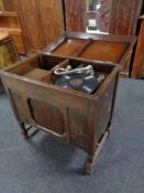 A 20th century Geisha gramophone in oak cabinet