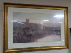 A gilt framed decorative print - Ruin by a river
