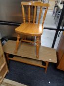 A pine dining chair and a mid century coffee table