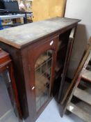 A Victorian glazed double door bookcase
