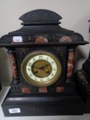 A Victorian slate mantel clock