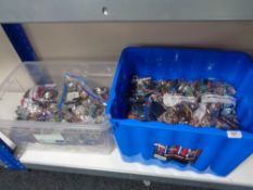 Two very large crates containing a massive quantity of costume jewellery in multiple bags