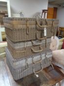 Three graduated wicker cases