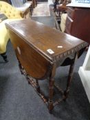 An Edwardian gate leg table