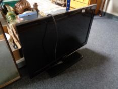 A Samsung 32 inc lcd tv with remote