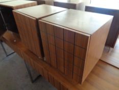 A pair of wooden bedside cabinets