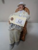 A Royal Doulton figure - Taking things easy HN 2680