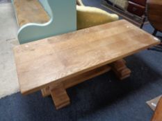 A solid oak low coffee table