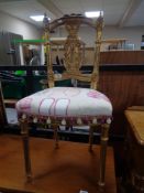 An antique style gilt hall chair