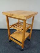 A pine kitchen butcher's block trolley