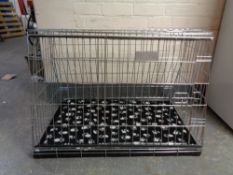 A folding dog cage,