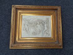 An ornately gilt framed cherub relief plaque