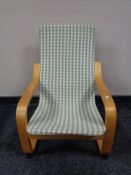 A child's beech framed armchair