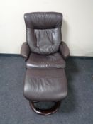 A John Lewis brown leather swivel relaxer chair and stool