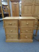 A pair of pine three drawer bedside chests