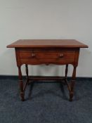 A side table fitted with a drawer