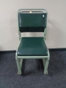 Four mid 20th century metal framed stacking chairs