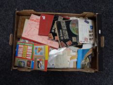 A box of stamp albums and stamps
