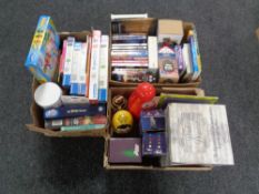 Three boxes of DVD's, board games, Russian dolls,