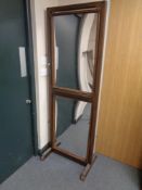 A 20th century stained wood adjustable glass cheval mirror