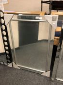 An all glass contemporary mirror,