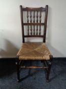 A rush seated country kitchen chair