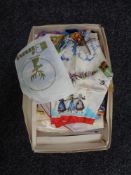 A box of vintage silk scarves