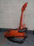 A Flymo Hover compact 350 electric mower and a Flymo strimmer