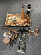 A box containing stone carving, carved wooden African figures,