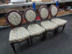 Four mahogany dining room chairs