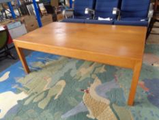 A 20th century rectangular beech wood coffee table