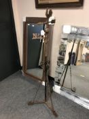 A wrought iron weather vane